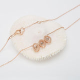 3 rope oval Cognac Dancing Diamond 14k rose gold necklace